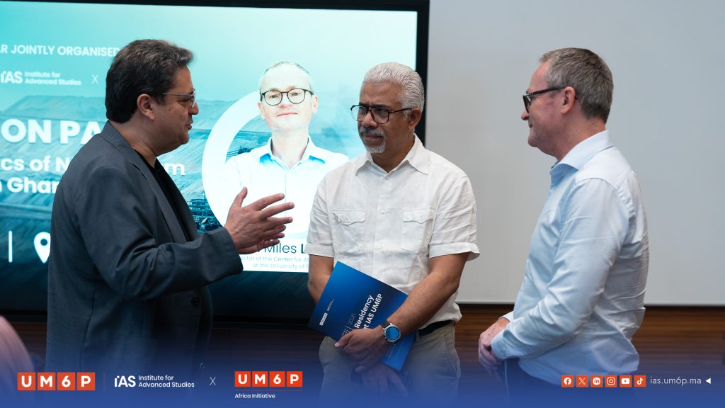 Participants speaking with Miles Larmer after the IAS UM6P seminar